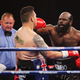 Kimbo Slice (right) fights Shane Tilyard during a bout Jan. 30, 2013, in Sydney.
Matt King/Getty Images